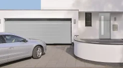 Porte de garage sectionnelle acier EcoStar WoodGrain blanc aluminium RAL 9006 - l.300 x h.200 cm - motorisée