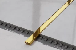 Profilé décoratif C en acier inoxydable pour carrelage Or poli - 10 mm x 2700 mm x 0,65 ep.